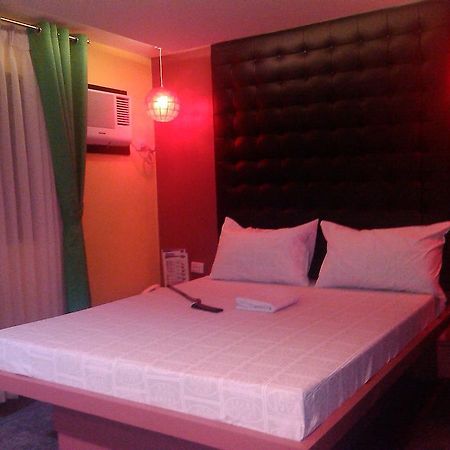 Hotel Icon Manila Zimmer foto