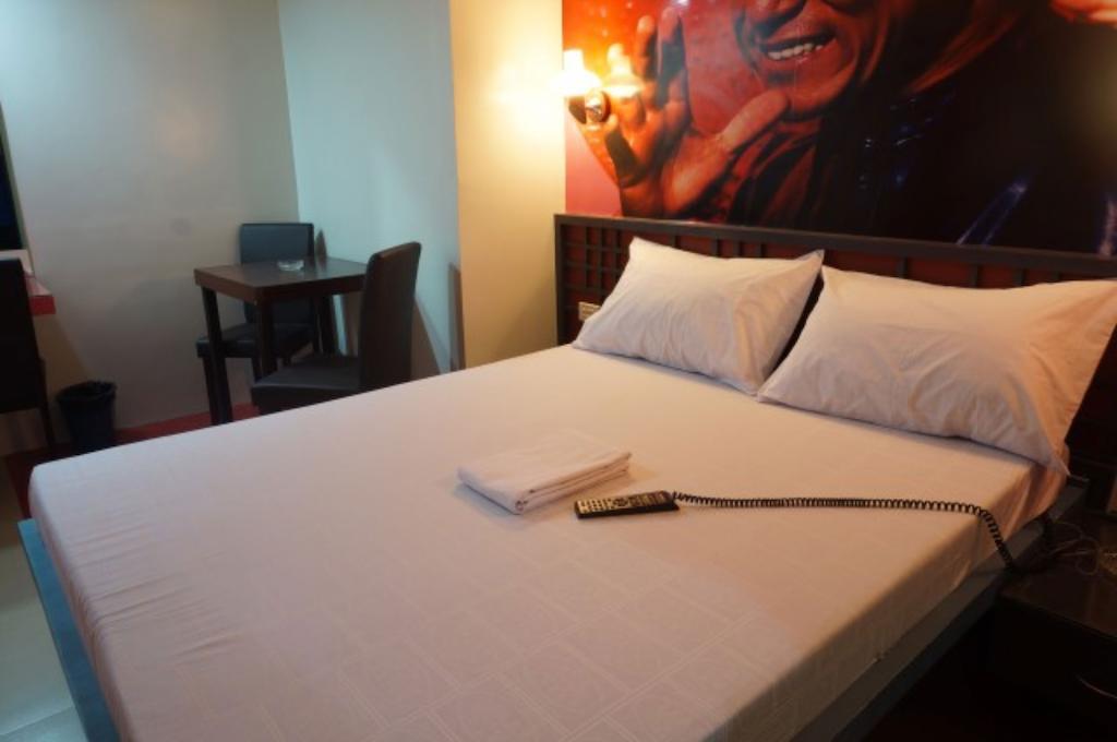 Hotel Icon Manila Zimmer foto