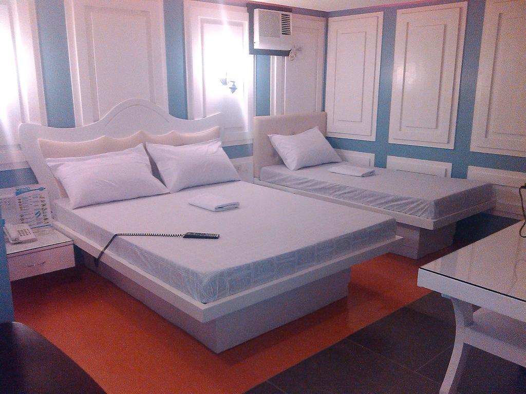 Hotel Icon Manila Zimmer foto