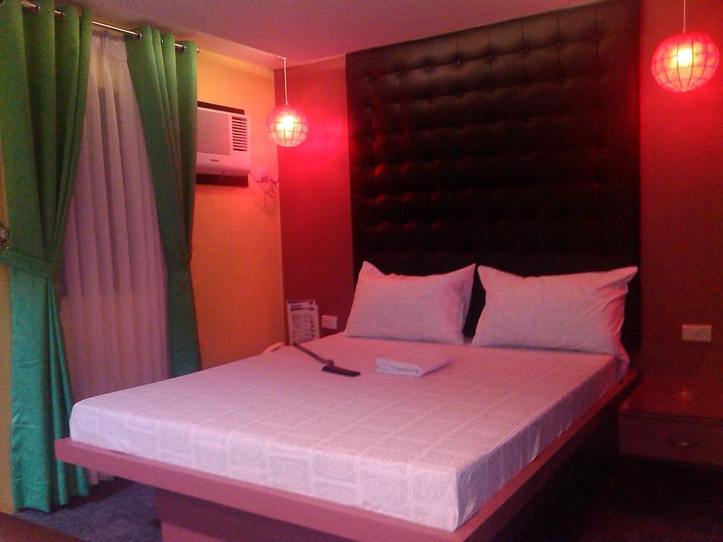 Hotel Icon Manila Zimmer foto